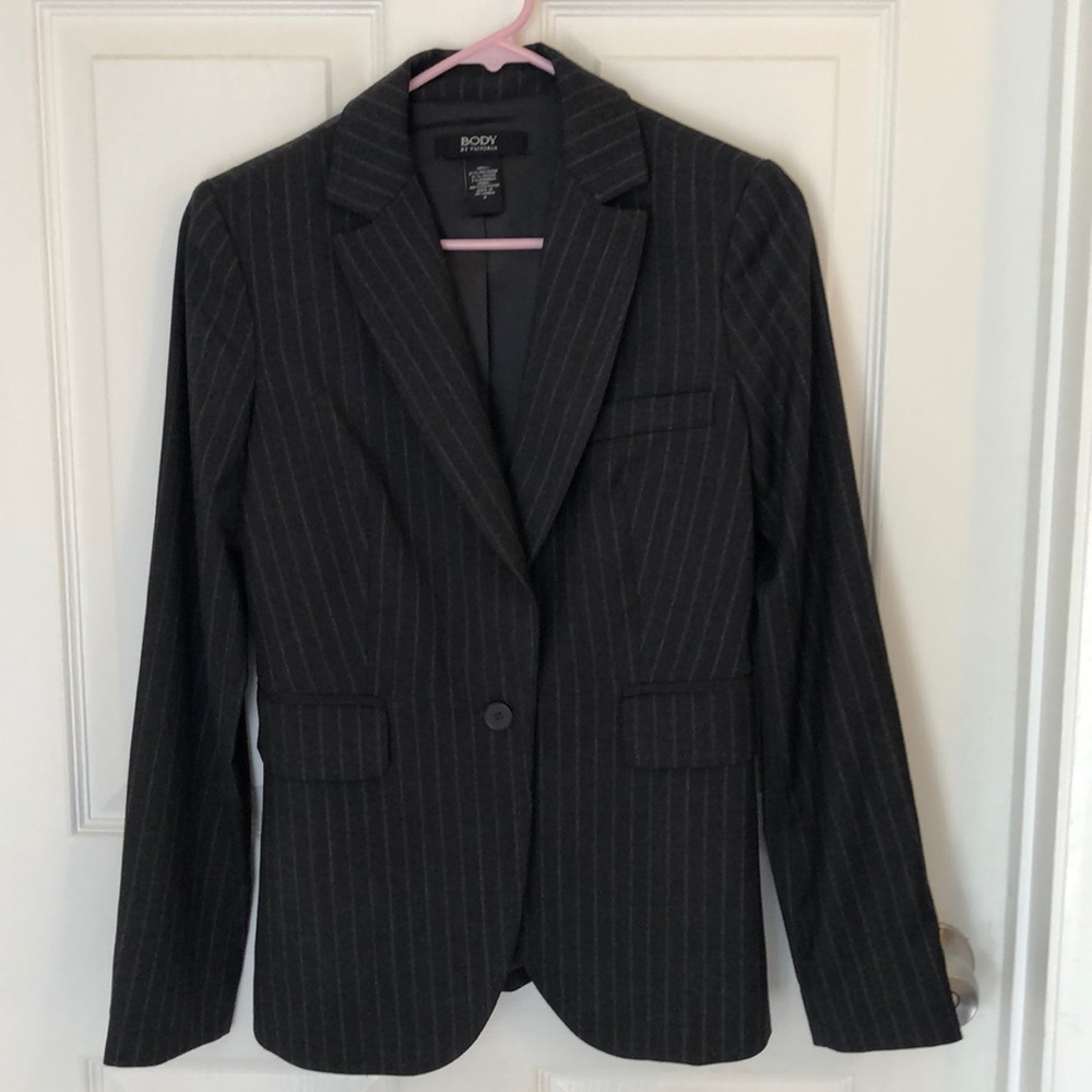 Black and gray pinstriped women’s suit jacket / blazer